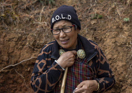 Bhutanese woman hiking in the mountain, Paro, Drakarpo, Bhutan