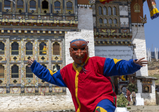 Masked atsara at the annual Ura Yakchoe festival, Bumthang, Ura, Bhutan