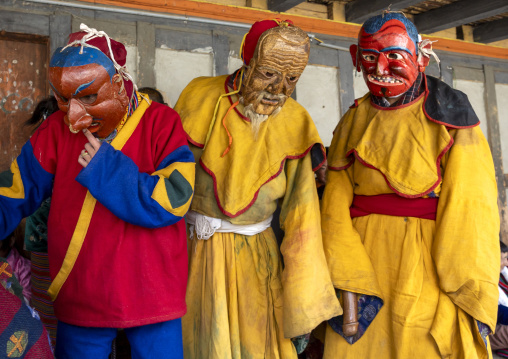 Masked atsaras at the annual Ura Yakchoe festival, Bumthang, Ura, Bhutan