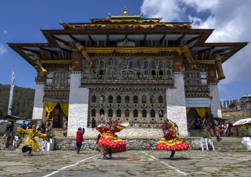 Mask dancers at the annual Ura Yakchoe festival, Bumthang, Ura, Bhutan