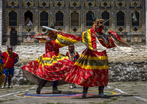 Mask dancers at the annual Ura Yakchoe festival, Bumthang, Ura, Bhutan