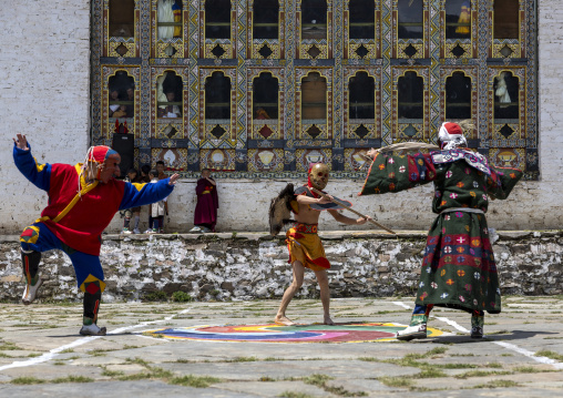 Masked atsaras at the annual Ura Yakchoe festival, Bumthang, Ura, Bhutan