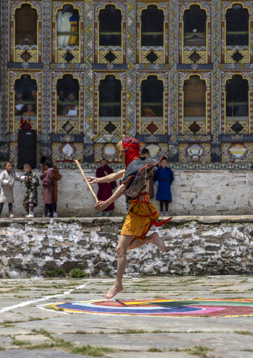 Masked atsaras at the annual Ura Yakchoe festival, Bumthang, Ura, Bhutan