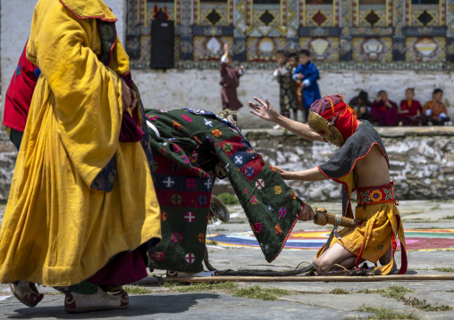 Masked atsaras at the annual Ura Yakchoe festival, Bumthang, Ura, Bhutan