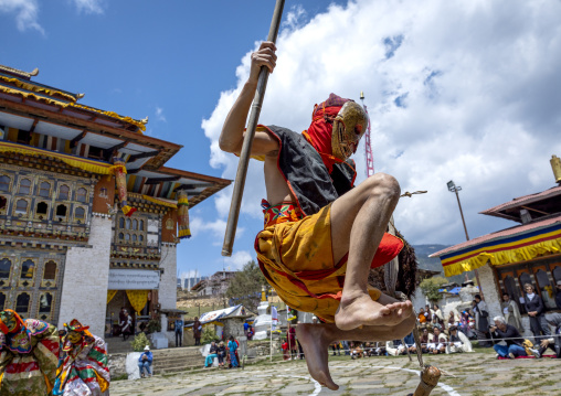 Masked atsara at the annual Ura Yakchoe festival, Bumthang, Ura, Bhutan