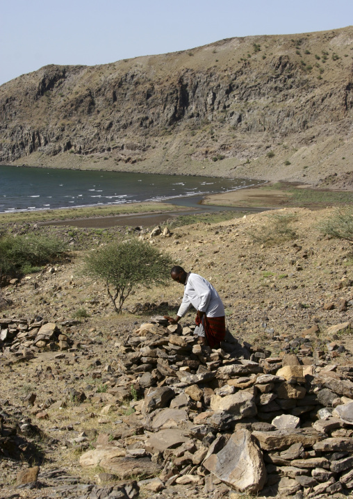 Afar man on a hot springs, Northern Red Sea, Thio, Eritrea