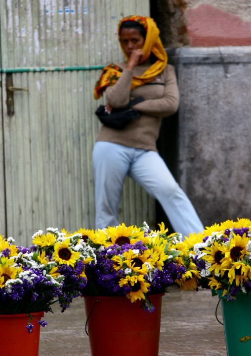 Eritrean woman selling flowers in the street, Central Region, Asmara, Eritrea