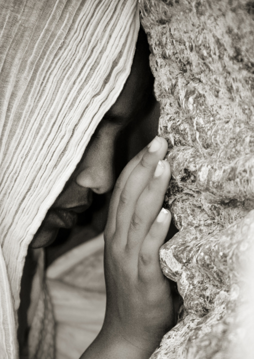 Woman praying on the baobab during festival of Mariam Dearit, Anseba, Keren, Eritrea