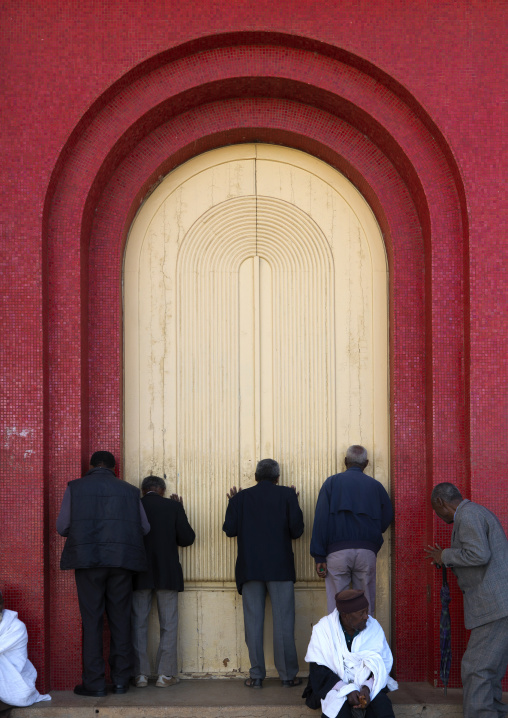 Eritrean people praying at Enda Mariam church
, Central Region, Asmara, Eritrea