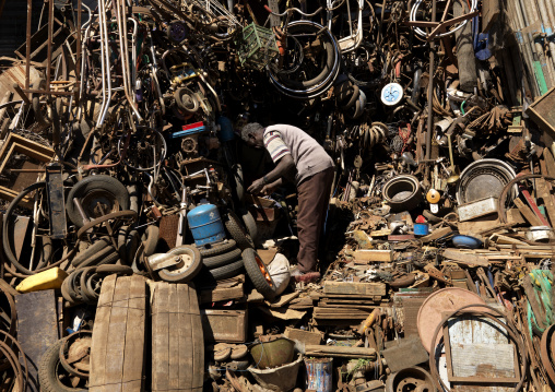 Eritrean man in medebar metal market, Central Region, Asmara, Eritrea