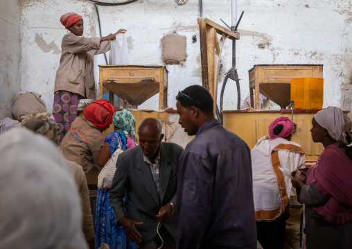 Eritrean people bringing grains to grind in a mill, Central region, Asmara, Eritrea