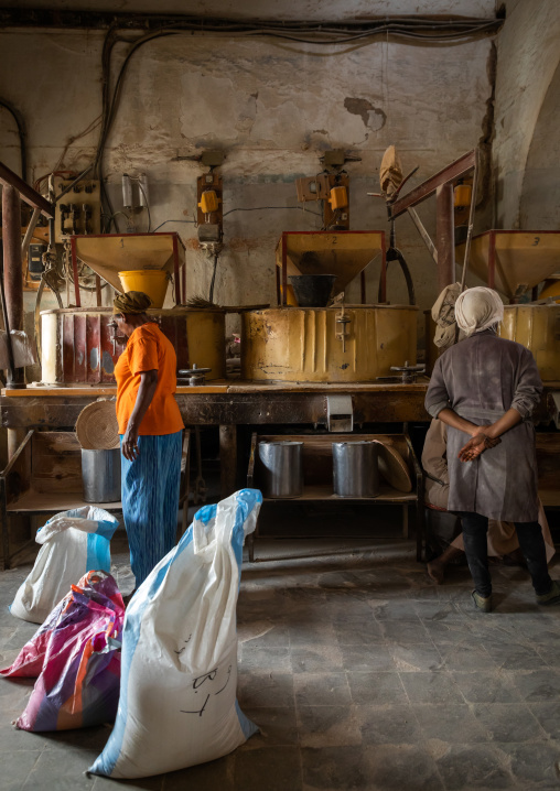 Eritrean people bringing grains to grind in a mill, Central region, Asmara, Eritrea