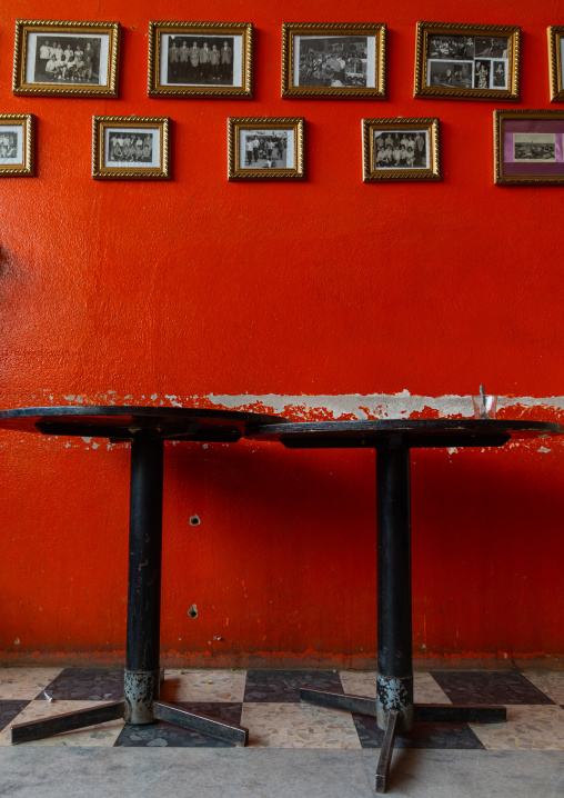 Old pictures hanging on a wall of the multi sport bowling, Central region, Asmara, Eritrea