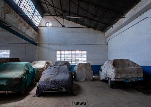 Cars under wraps old FIAT garage now used as a parking, Central region, Asmara, Eritrea