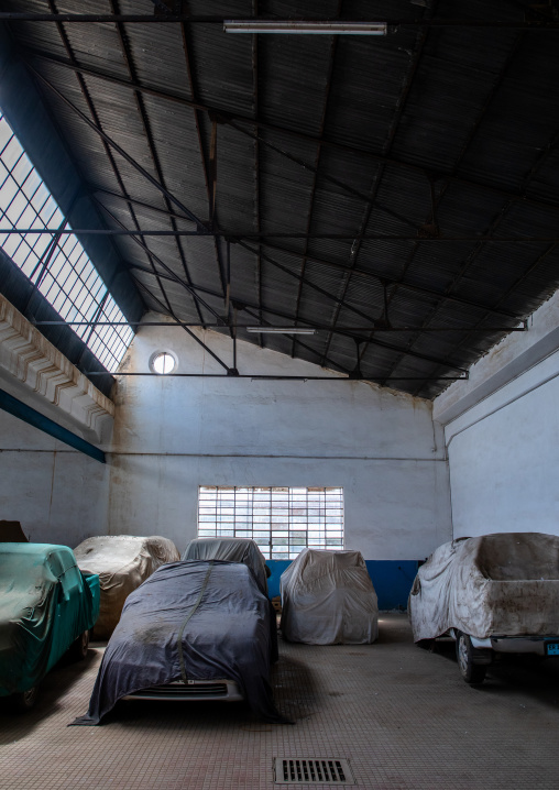 Cars under wraps old FIAT garage now used as a parking, Central region, Asmara, Eritrea