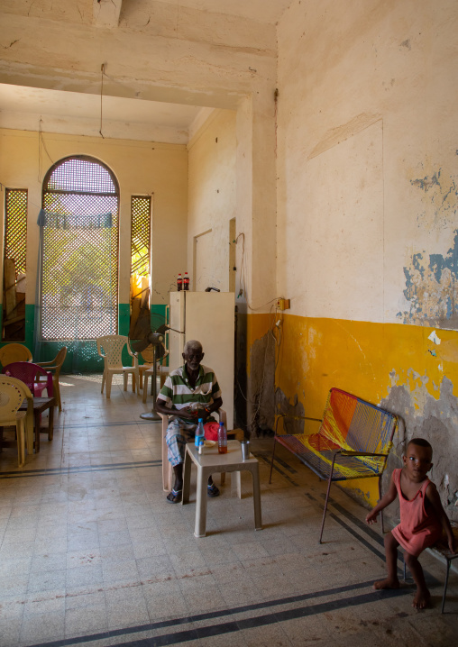 Eritrean man having a drink in a local bar, Northern Red Sea, Massawa, Eritrea