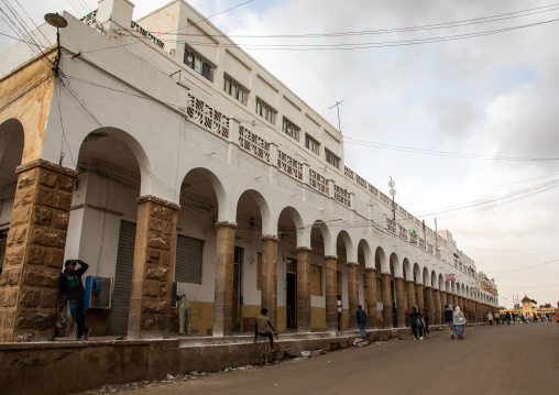 Old art deco style building with arches from the italian colonial times, Central region, Asmara, Eritrea