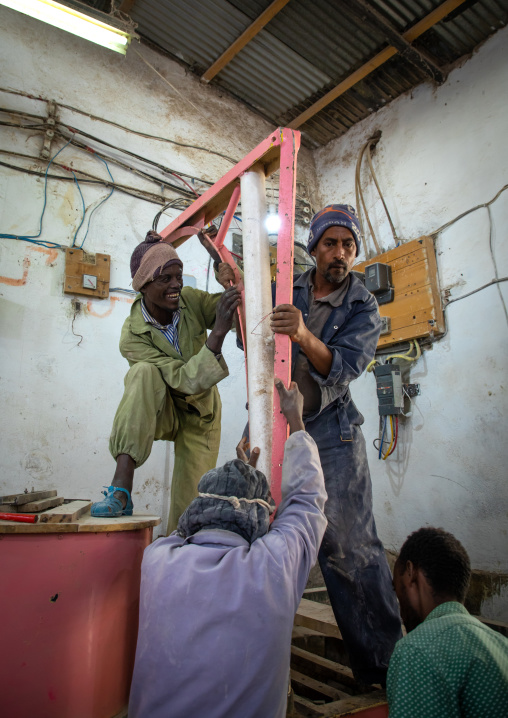 Eritrean people bringing grains to grind in a mill, Central region, Asmara, Eritrea