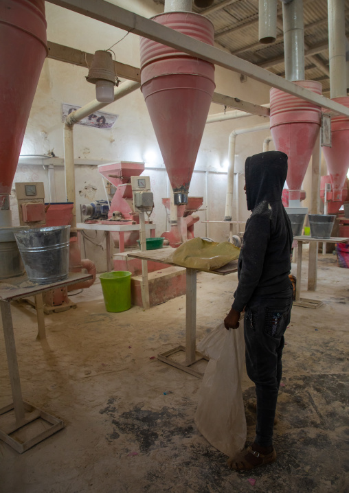 Eritrean people bringing grains to grind in a mill, Central region, Asmara, Eritrea