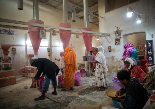 Eritrean people bringing grains to grind in a mill, Central region, Asmara, Eritrea