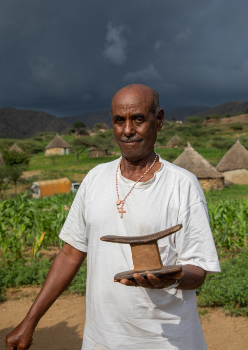 Bilen tribe with his wooden pillow, Semien-Keih-Bahri, Elabered, Eritrea