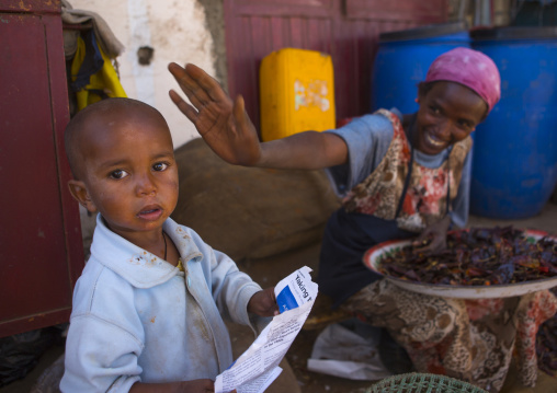 Mother and child in medebar metal market, Central Region, Asmara, Eritrea