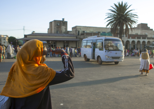 Eritrean woman waiting for a bus, Central Region, Asmara, Eritrea