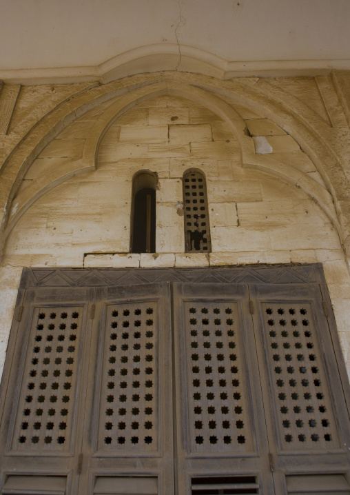 Wooden door in the ruins of the old palace of Haile Selassie, Northern Red Sea, Massawa, Eritrea