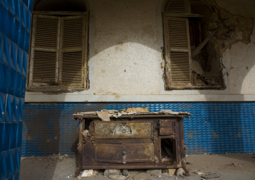 Rusty oven in the ruins of the old palace of Haile Selassie, Northern Red Sea, Massawa, Eritrea