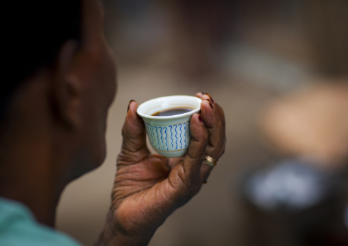 Eritrean woman drinking coffee, Northern Red Sea, Massawa, Eritrea