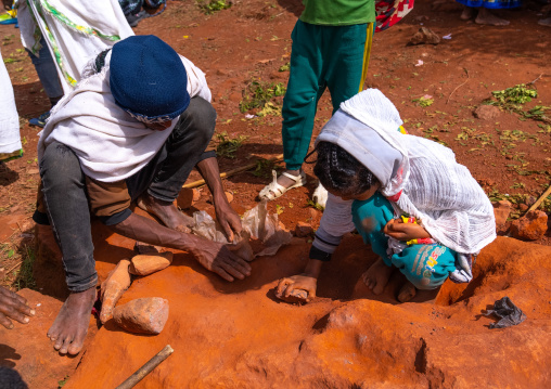 Ethiopian people collecting holy soild in Bilbaia Giorgis rock-hewn church, Amhara Region, Lalibela, Ethiopia