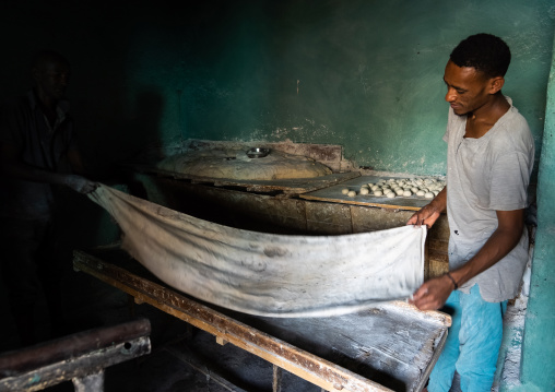 Ethiopian men working in a bakery, Harari Region, Harar, Ethiopia