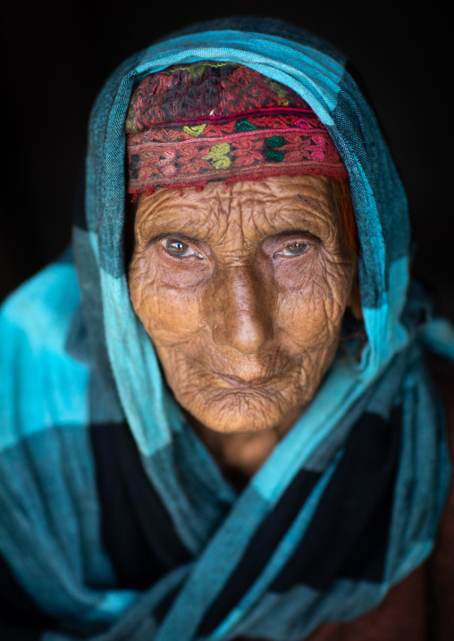 Portrait of an old Gujjar Bakerwal veiled woman, Jammu and Kashmir, Yusmarg, India