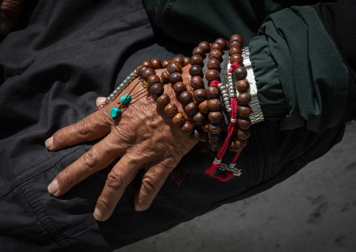 Buddhist hand with a payer beads, Ladakh, Leh, India