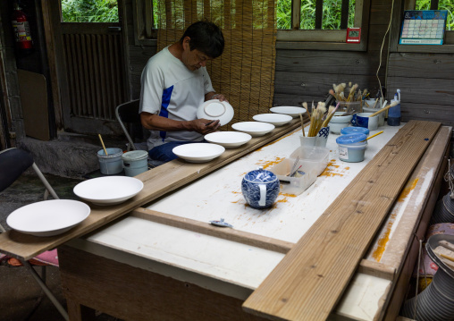 Artisan in Genemongama porcelain atelier, Kyushu region, Arita, Japan