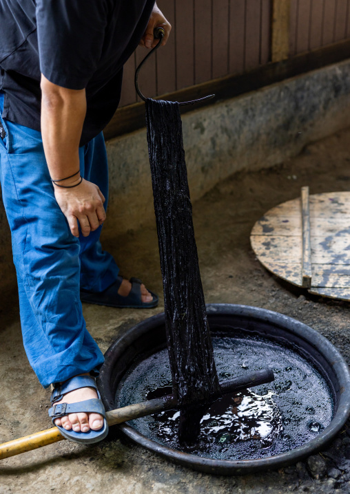 Kurume Kasuri indigo dyeing process in Aika Tanaka Kasuri Kobo workshop, Kyushu region, Chikugo, Japan