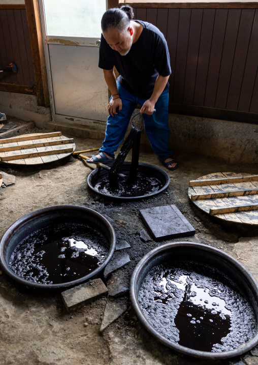 Kurume Kasuri indigo dyeing process in Aika Tanaka Kasuri Kobo workshop, Kyushu region, Chikugo, Japan