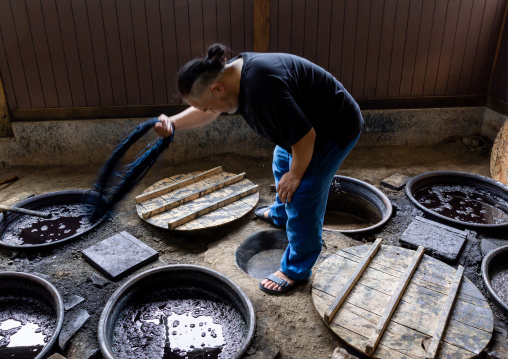 Kurume Kasuri indigo dyeing process in Aika Tanaka Kasuri Kobo workshop, Kyushu region, Chikugo, Japan