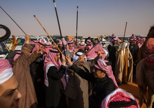 Saudi men dancing during King Abdul Aziz Camel Festival, Riyadh Province, Rimah, Saudi Arabia