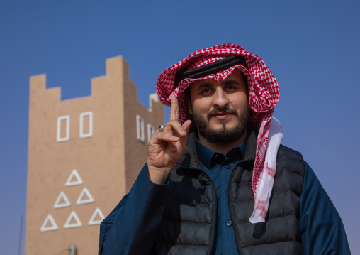 Saudi man in King Abdul Aziz Camel Festival, Riyadh Province, Rimah, Saudi Arabia