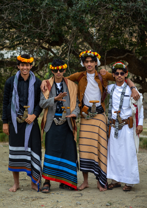 Portrait of flower men wearing floral crowns, Asir province, Sarat Abidah, Saudi Arabia