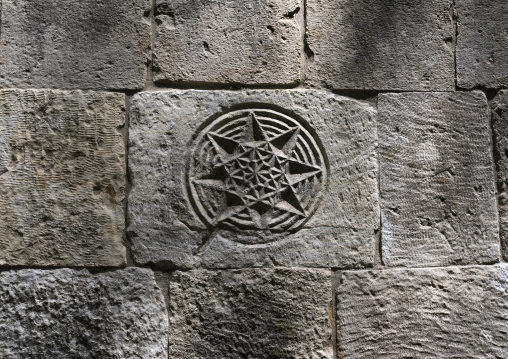 Sun carved in a stone in Ali Pacha Joumblatt abandonned palace, Mount Lebanon Governorate, Baadarane, Lebanon