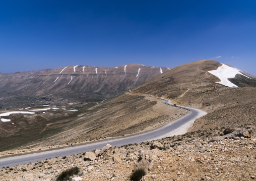 Road in the mountain with patches of snow, North Governorate, Daher el Kadib, Lebanon