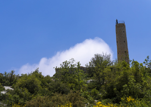 Christian statue at the top of a tower on a hill, North Lebanon Governorate, Hardine, Lebanon