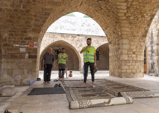 Men in Al Mansouri Al Kabir mosque, North Governorate, Tripoli, Lebanon