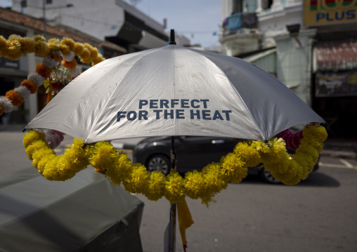 Umbrella on a rickshaw to protect from the heat, Penang island, George Town, Malaysia