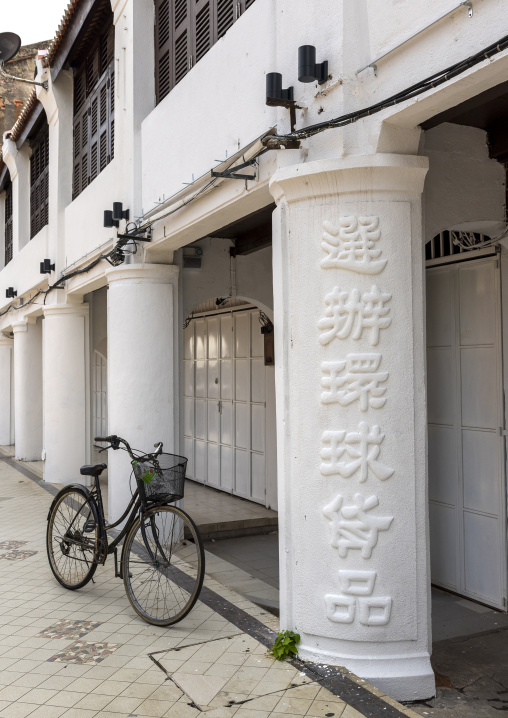 Old shop column with chinese script in the Unesco World Heritage area, Penang island, George Town, Malaysia