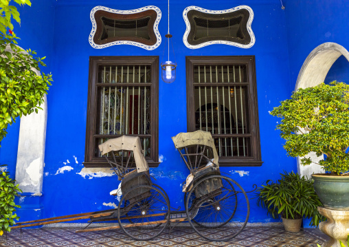 Rickshaws in Cheong Fatt Tze Chinese Mansion, Penang island, George Town, Malaysia