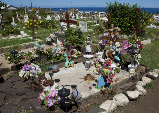 Decorated tombs in cemetery, Easter Island, Hanga Roa, Chile