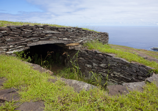 Restored houses in a ceremonial village, Easter Island, Orongo, Chile